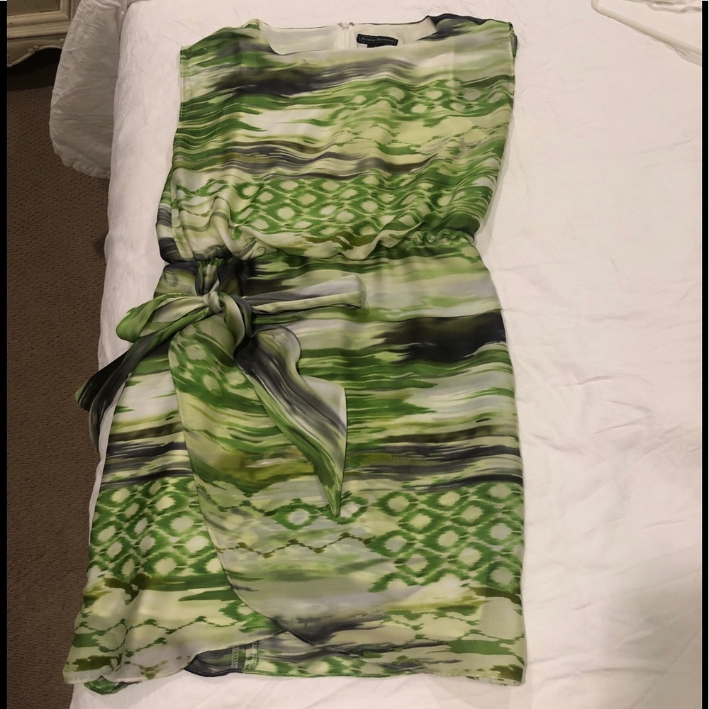 Flattering whimsical Dress with a tie at the hip
